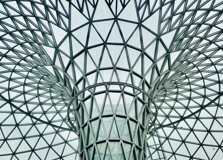 looking up at the inside of a steel sculpture