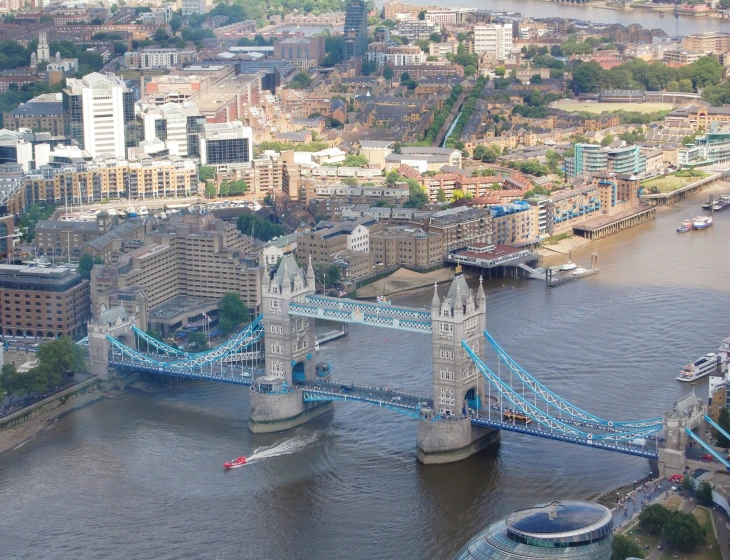 an aerial po of the city and the bridge