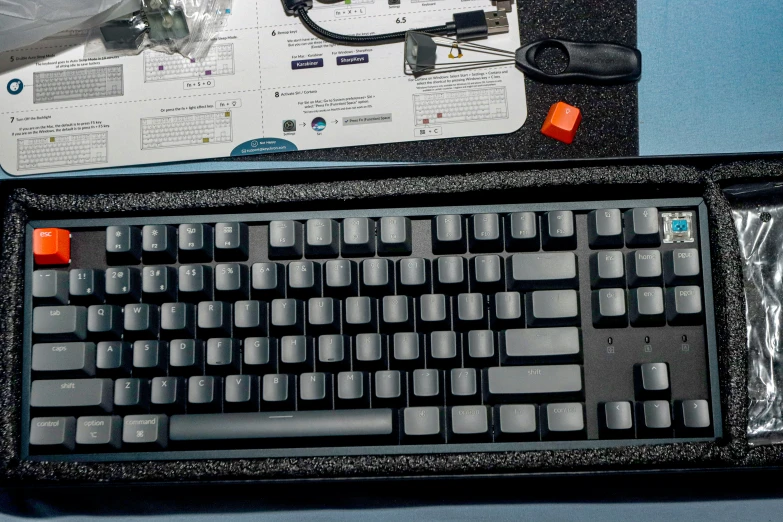 a black keyboard with its own keypad and other equipment