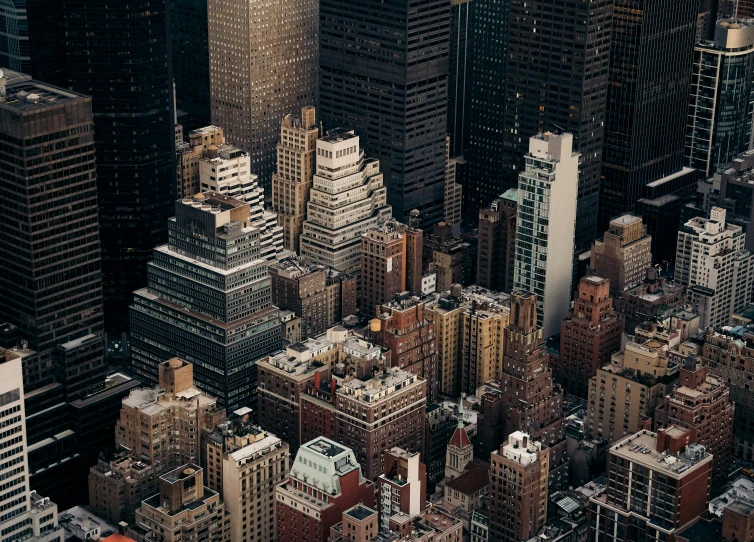 an aerial view of tall buildings in a city
