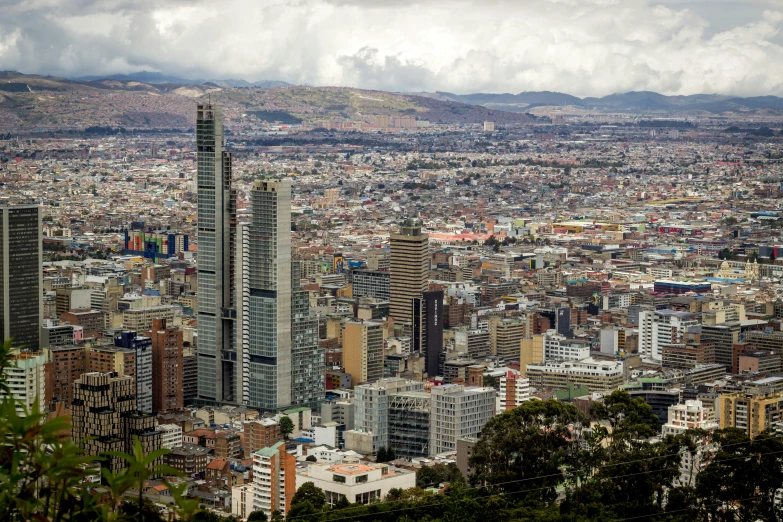 a city is surrounded by tall buildings