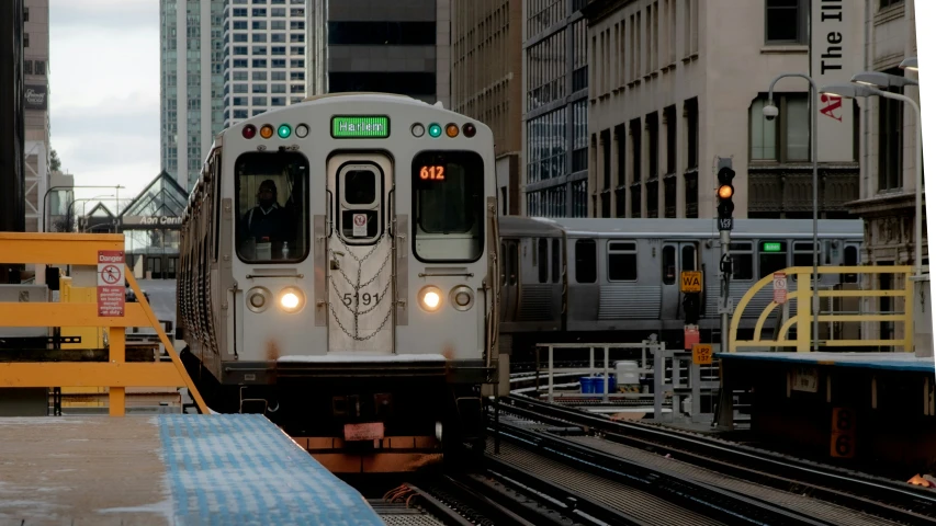 the city commuter train makes it's way through the city