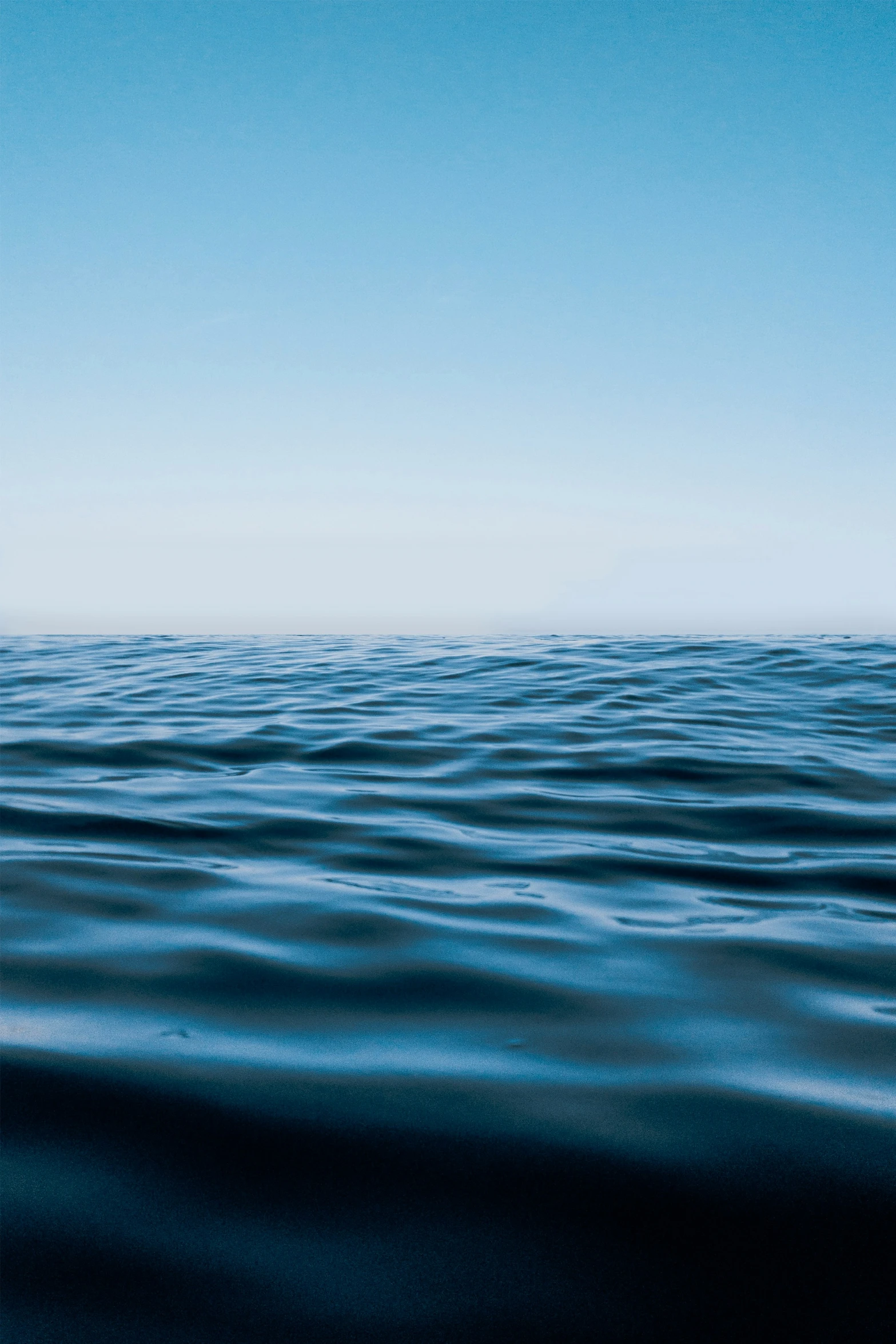 a view of the water from a large ship