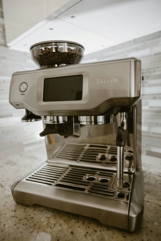 the espresso machine is set up on top of the counter