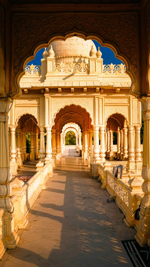 the sun shining on an old, ornate building