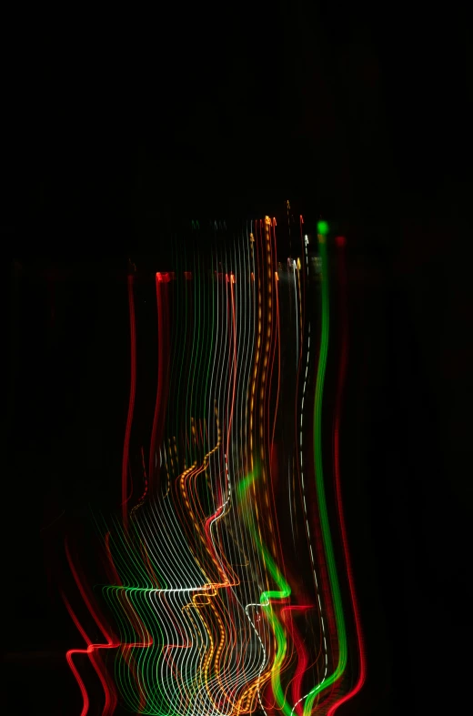 the abstract image shows lines of light in the dark