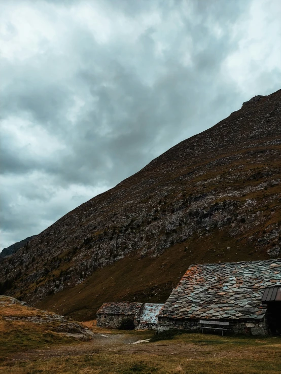 this is a hut at the base of a mountain