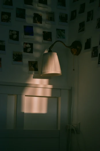 a small lamp that is on a wall