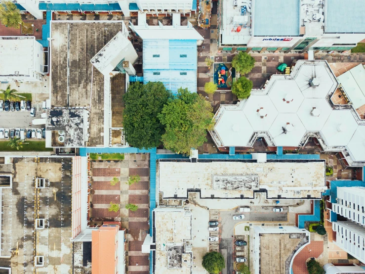 aerial view of an urban city with train tracks