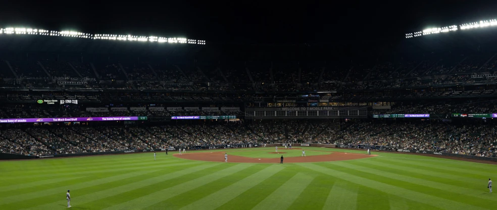 a full stadium with a baseball game in progress