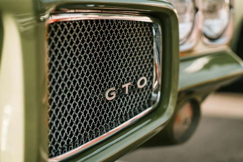 a close up view of the grill of a vintage truck