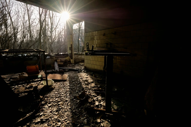 a dark po of a brick oven on the ground