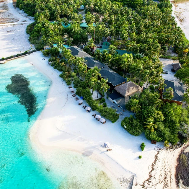 an aerial view of the beach resort and surrounding area