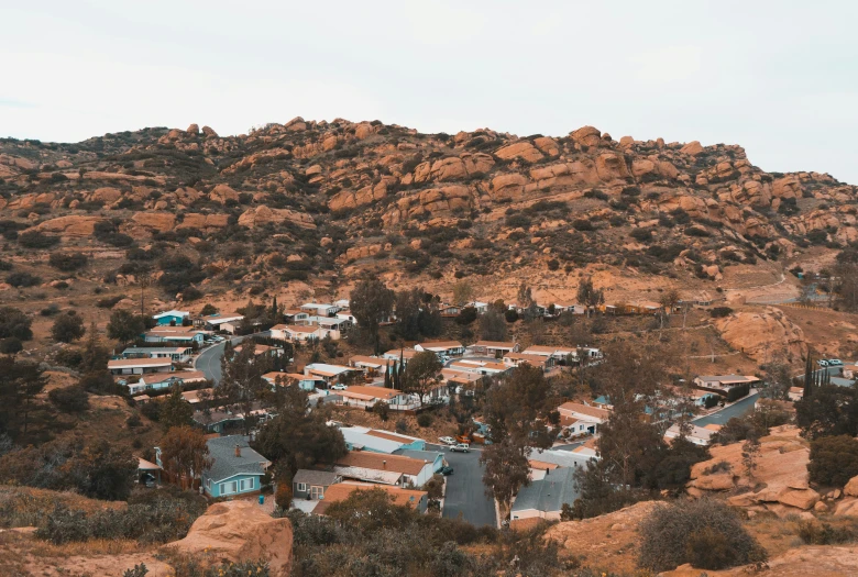 the village is nestled up on the mountain side