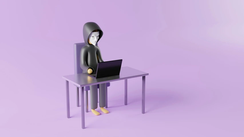 a person in a hooded avatar working on a laptop