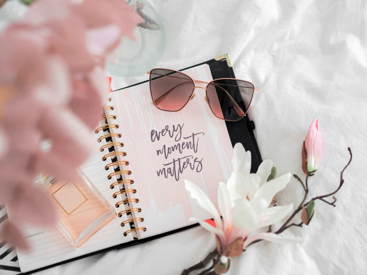 a notebook on a bed, with the title'dearest wonderful mother '