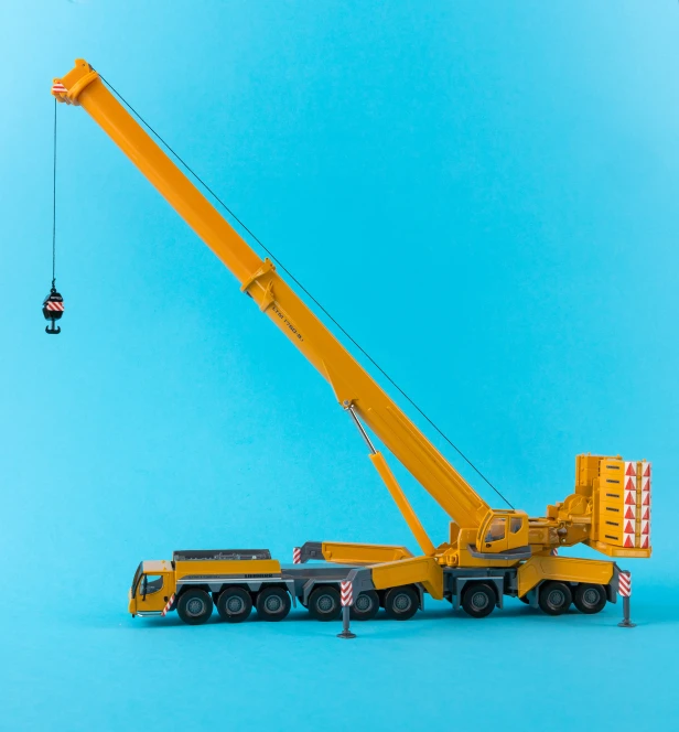 a construction vehicle with a crane on the back