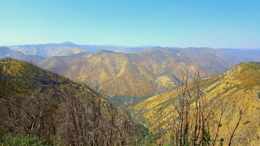 a view of the mountain range from a hilltop