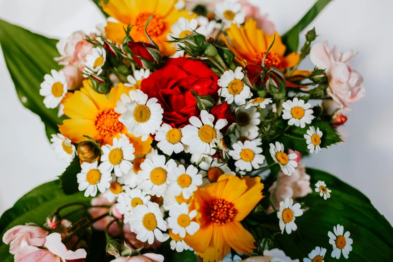 the flowers are on top of a large bouquet