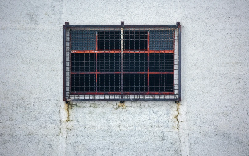 a large window with a grated pattern in it