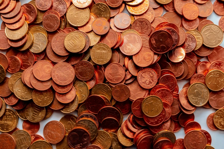 close up of a pile of penns, some in different languages