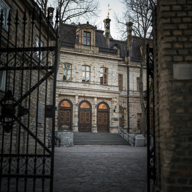 two doors open in to a gated walkway