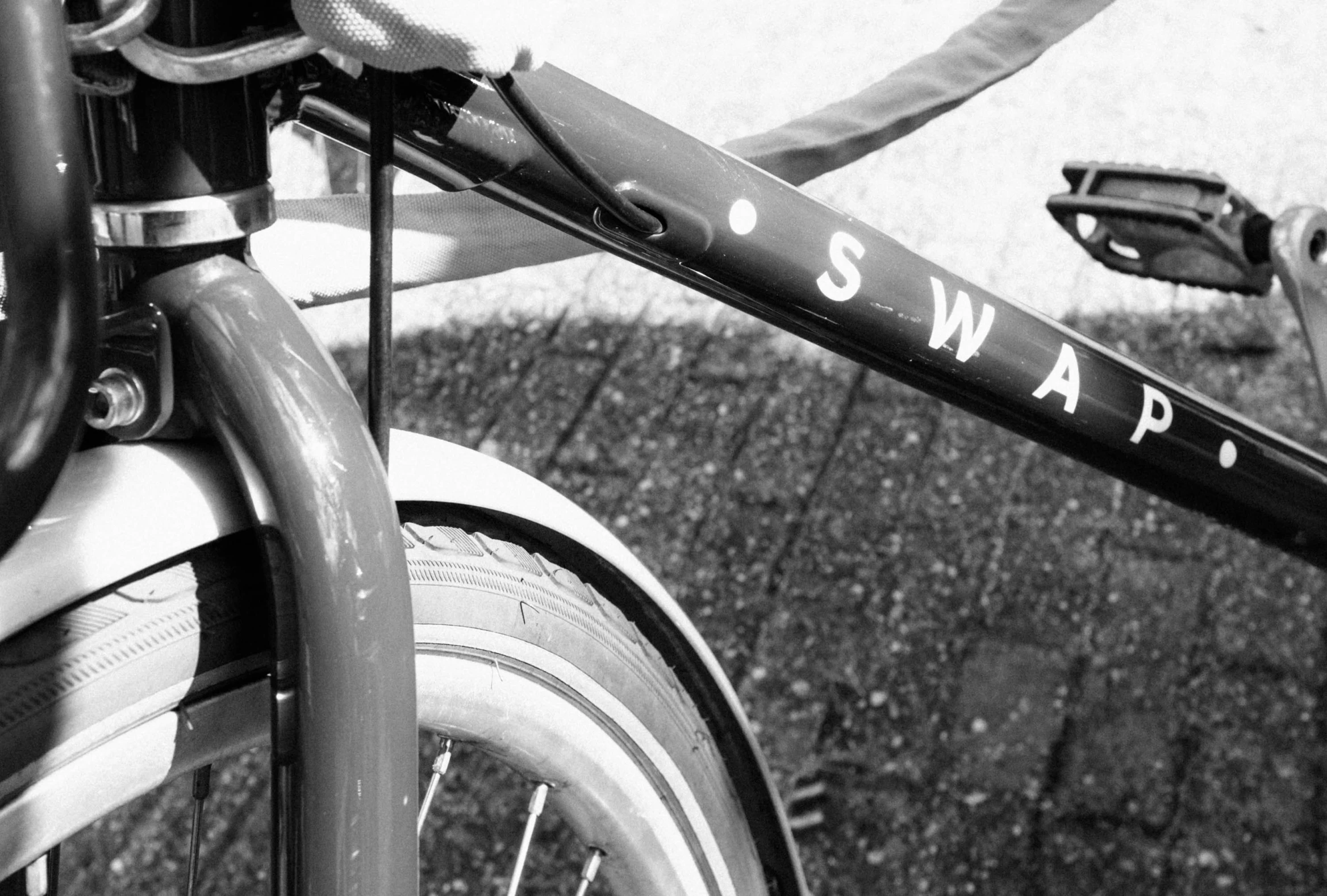 a bike that is parked on the side of a street