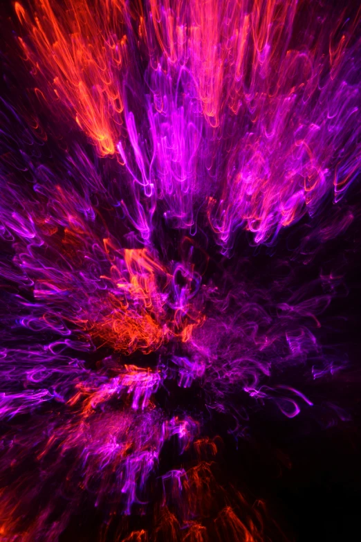 abstract purple and pink image with large amount of light