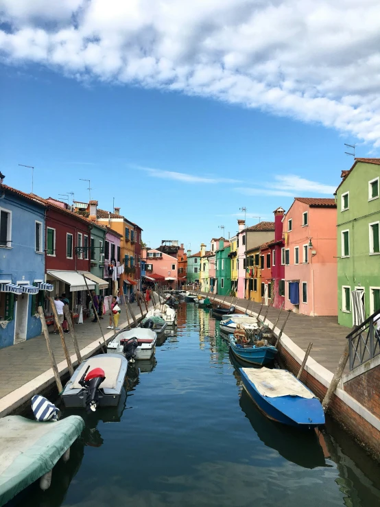 there are several small boats on the water