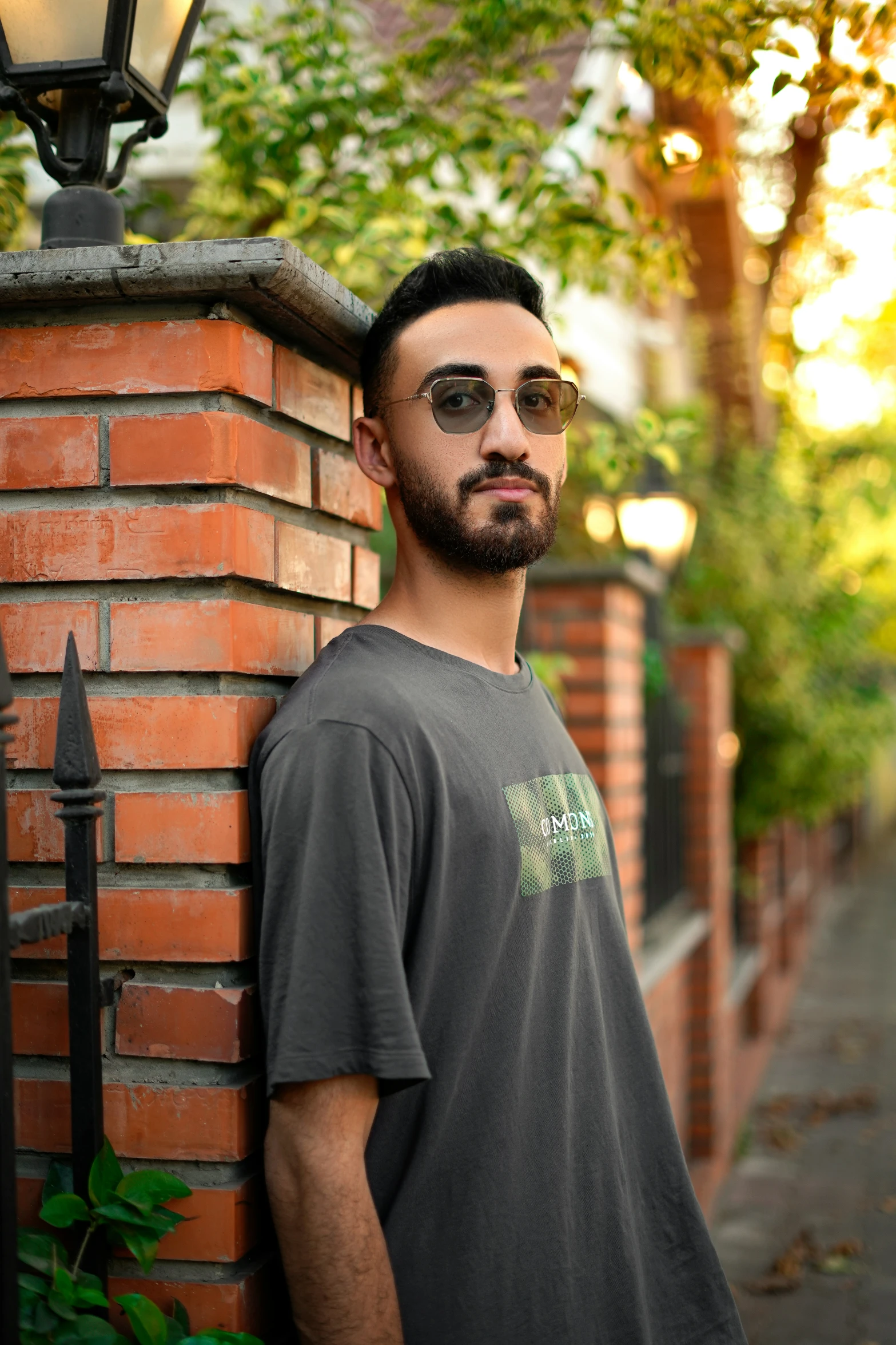 a man standing in front of a lamp post