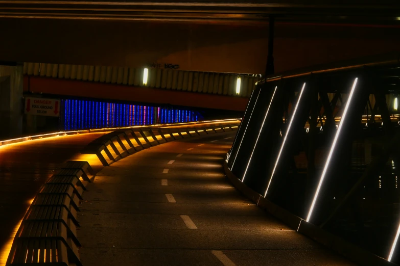 a lit bench is sitting in the middle of an airport terminal