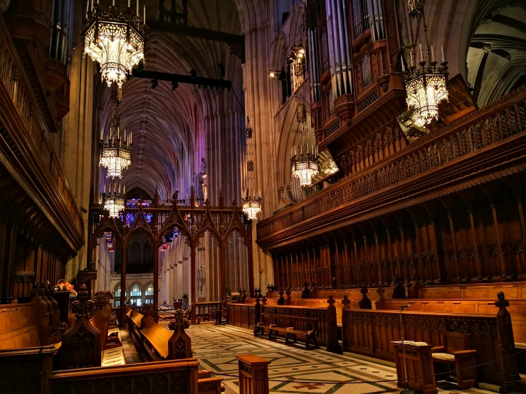 an cathedral with chandeliers and stained glass windows