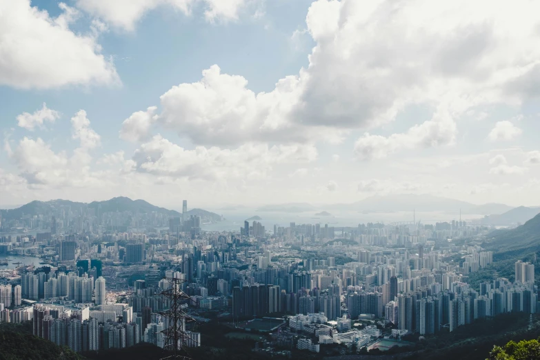 a cloudy view of the city from an overlook point