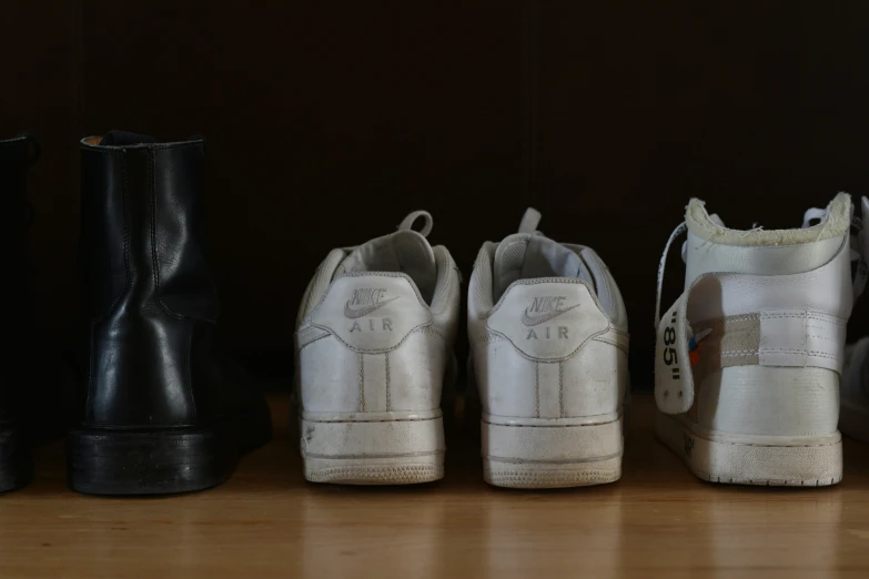 an array of different size, sizes and color shoes lined up together