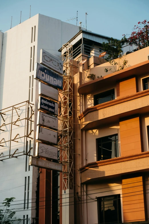 a building under construction next to the corner of a street