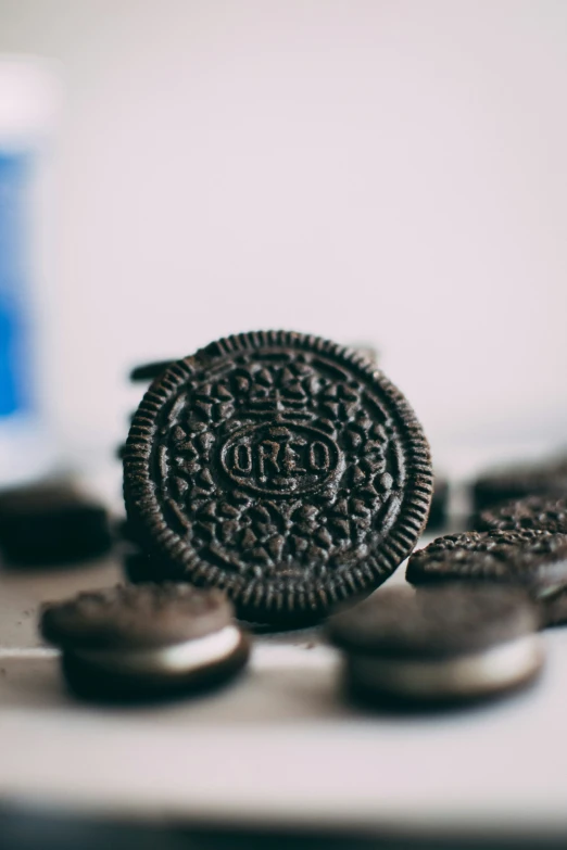 two cookies with oreos on a table