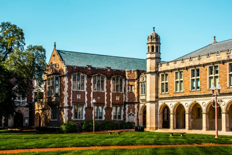 a large brick building with columns and arches