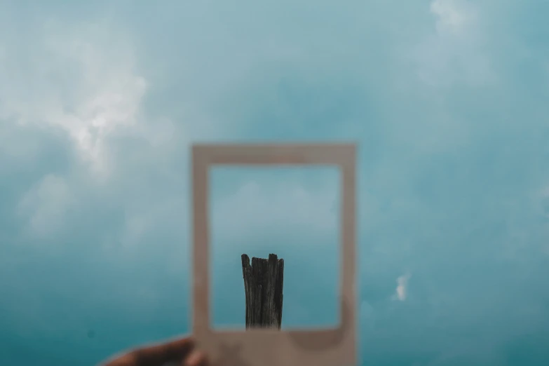 an image of a mirror showing a wood structure