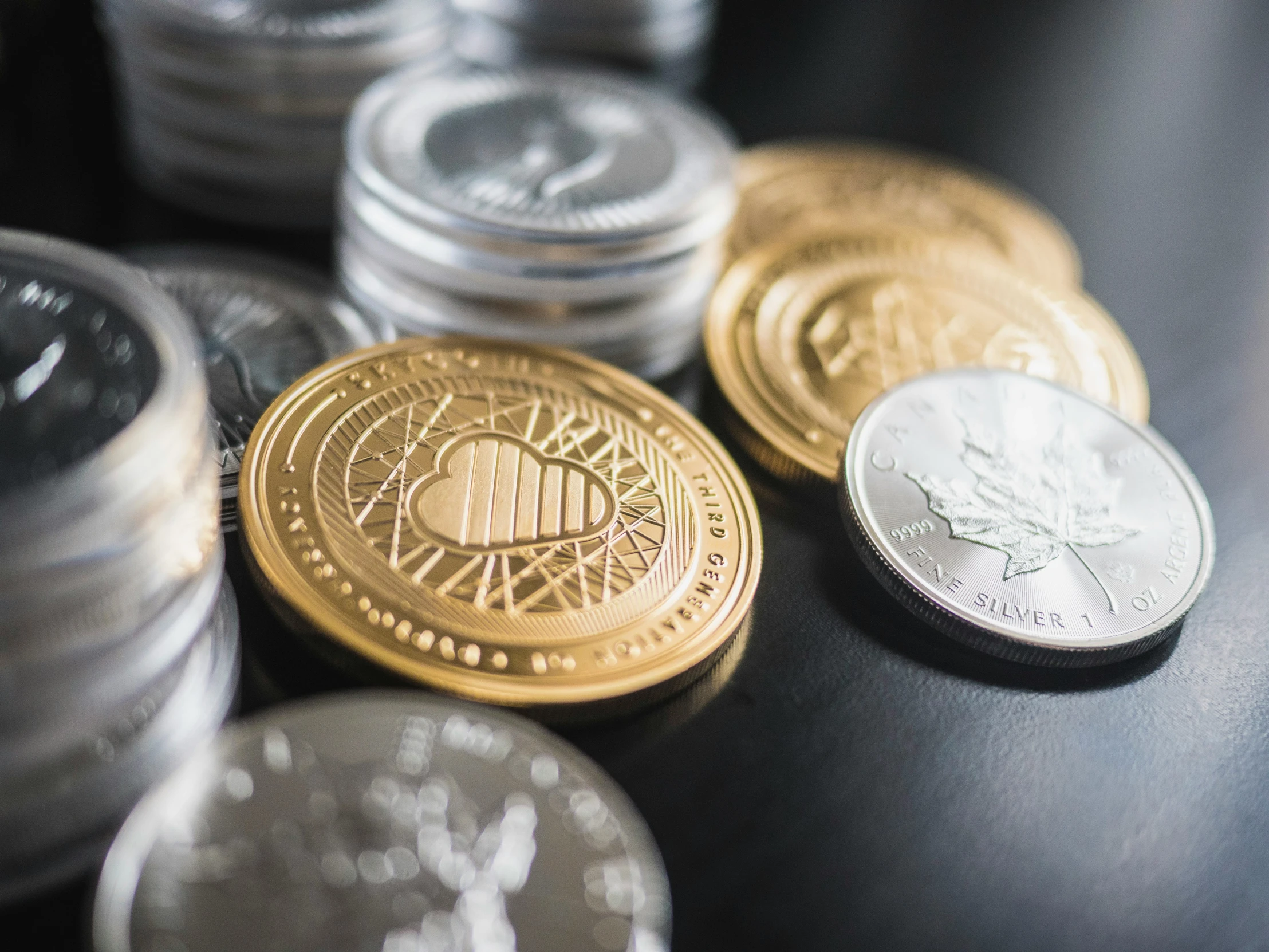 many coins are next to each other on a table