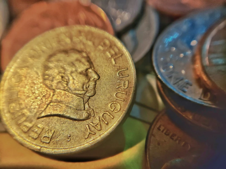 a close up view of one penny and a coin