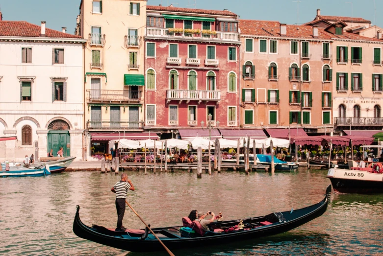 a person rowing a boat through some water