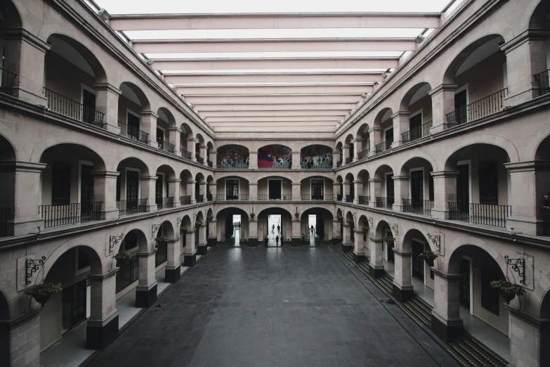 an empty building with a skylight is seen