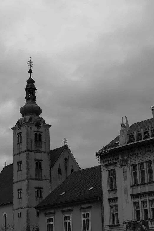 an old church with a steeple that is very high