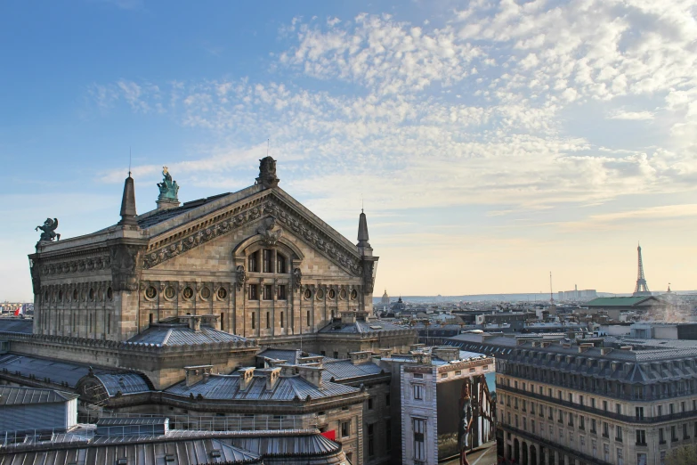 the roof top of a building with a clock tower