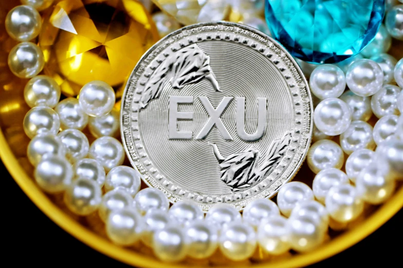 an exu coin surrounded by many pearls