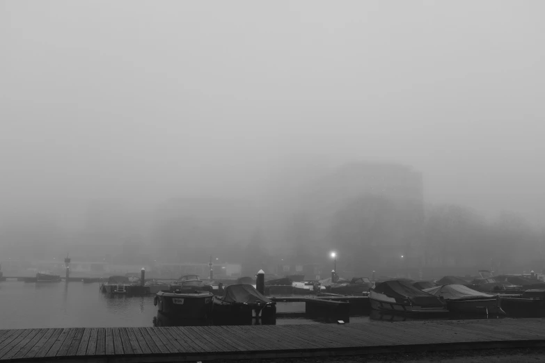 a couple of boats are sitting on the dock