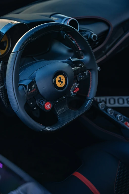 a ferrari style steering wheel inside of a car