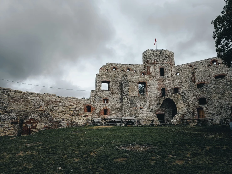 an old brick castle is shown in the dark