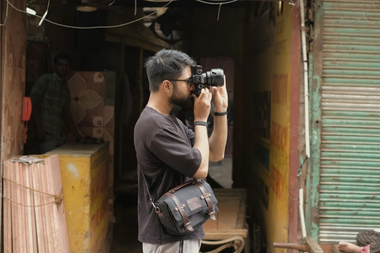 a man takes his picture with a camera