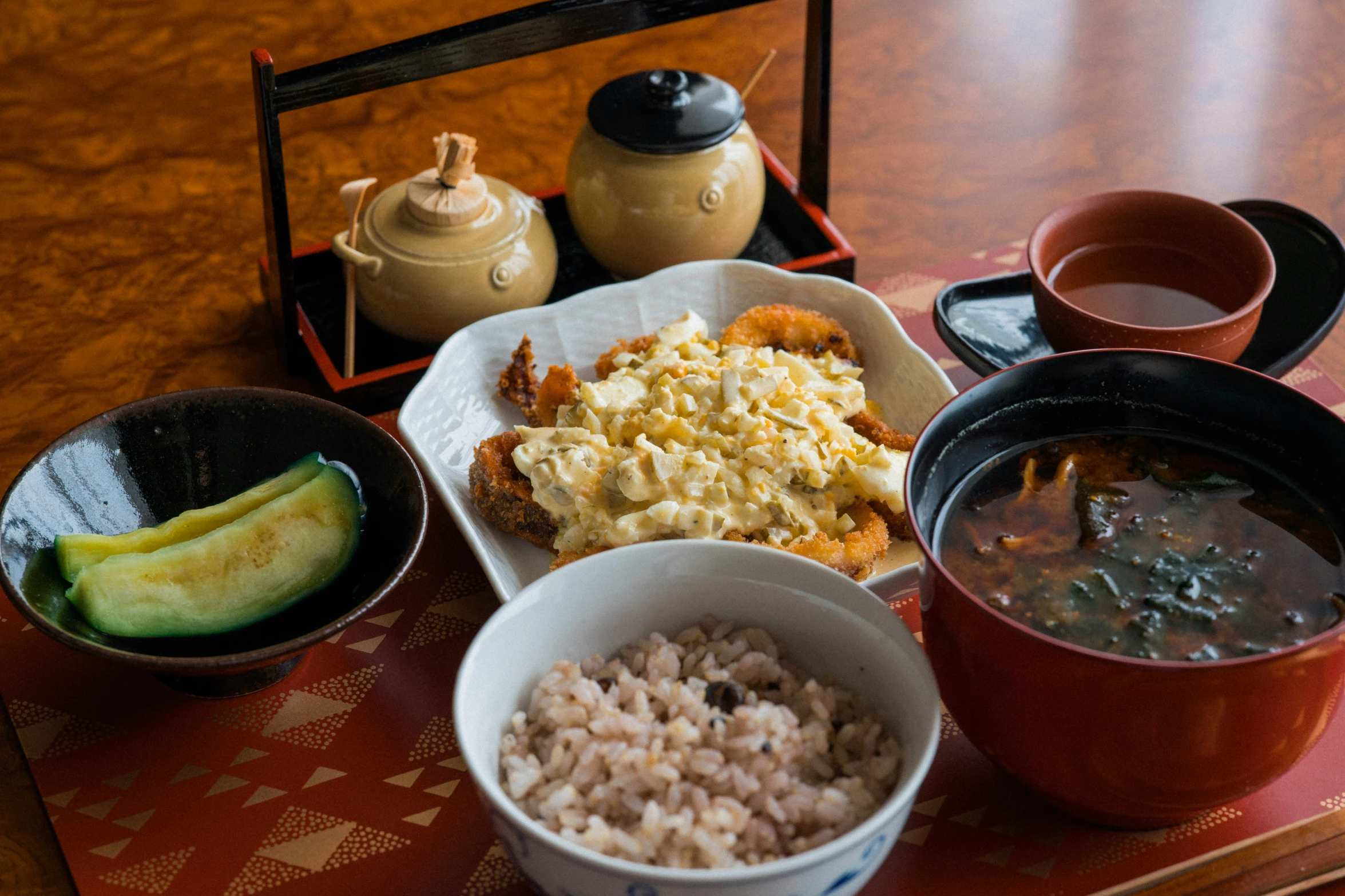 four bowls of food on top of a table